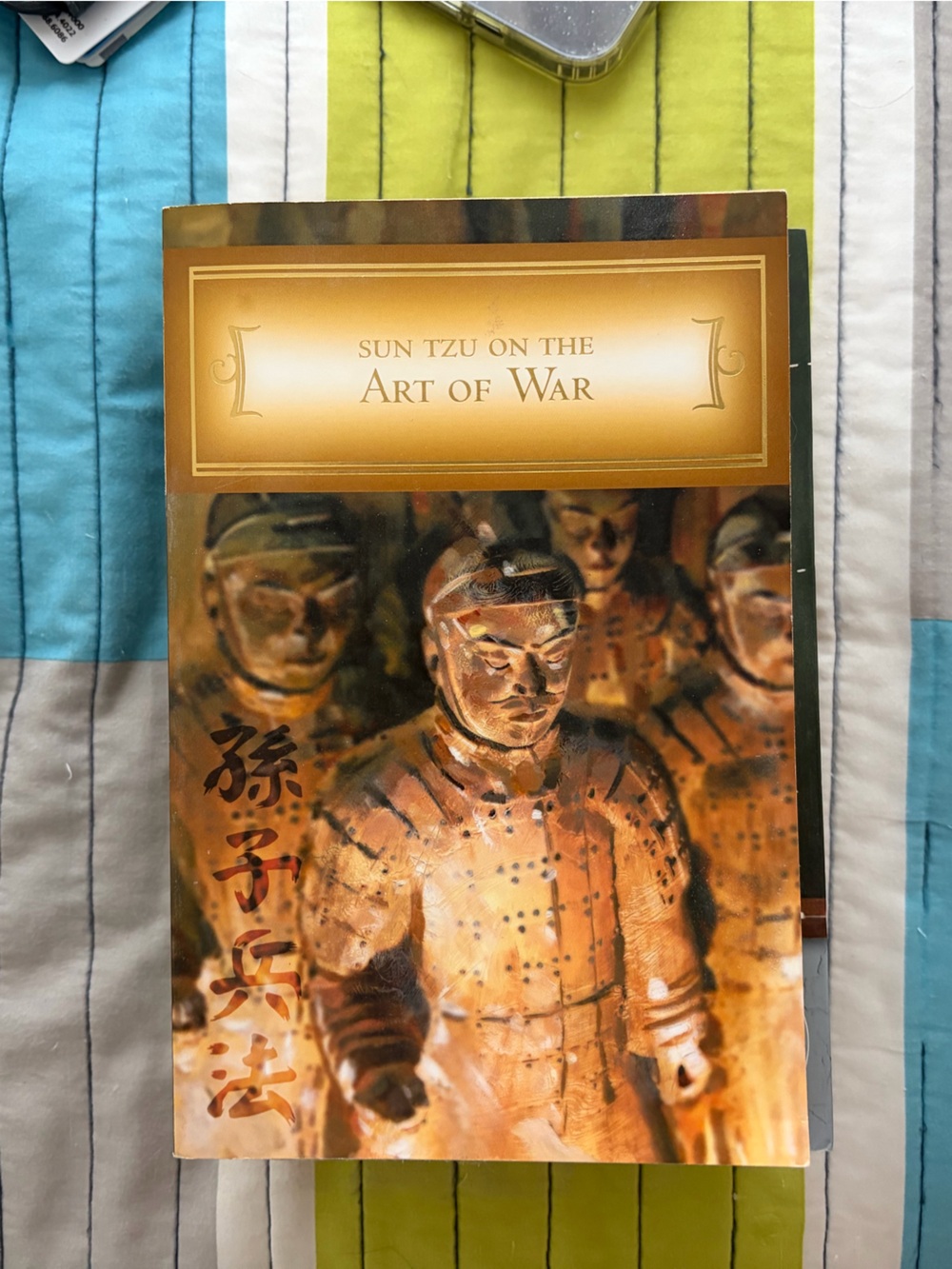 Sun Tzu on The Art of War — Gold/Brown book